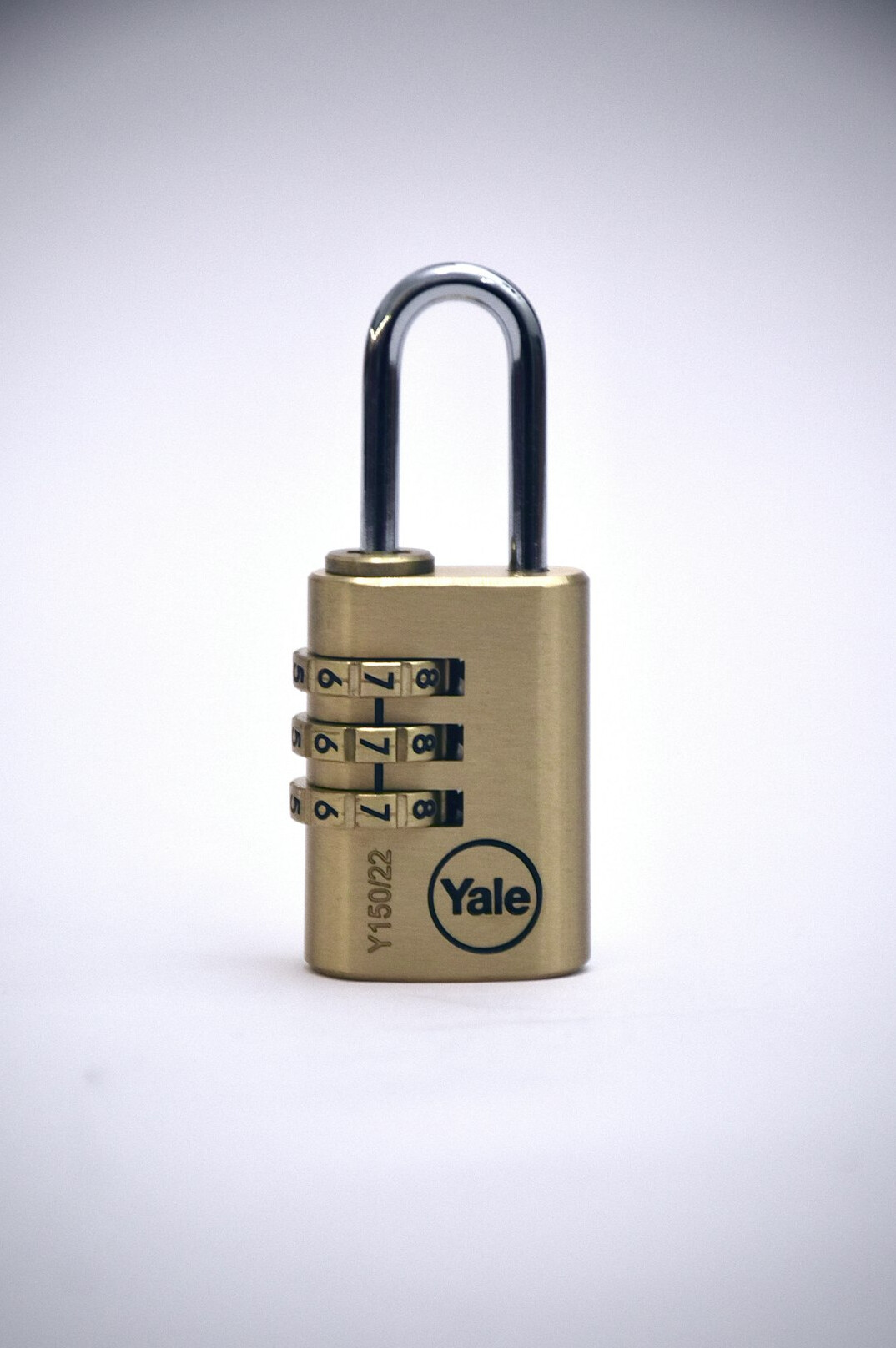 Digital padlock icon over a background of binary code